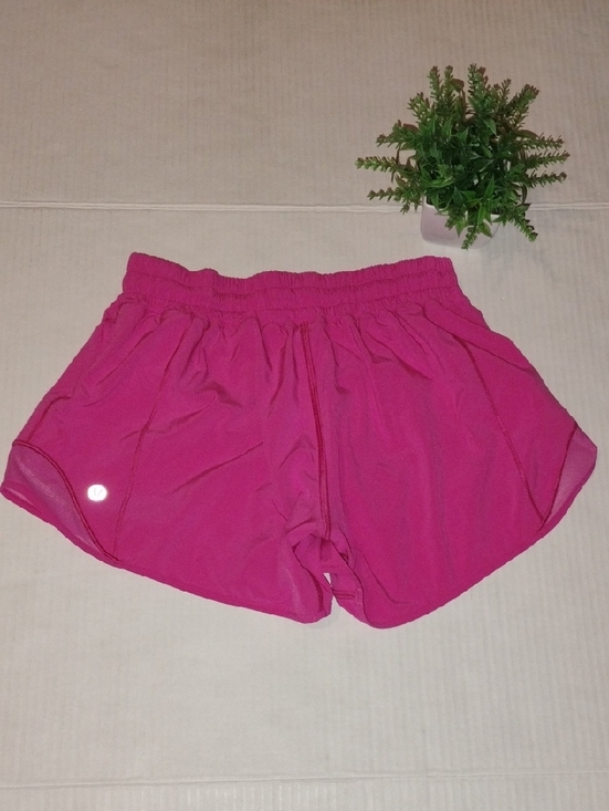 lululemon athletica Pants - lululemon athletica Sonic Pink Hotty Hot Shorts. Women's size 4.